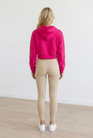 Leggings beige realizzati con tessuto elasticizzato, imbottiti e a vita alta.