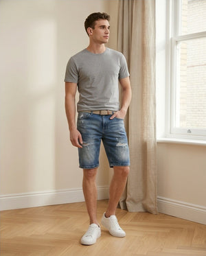 Bermuda uomo in denim scuro con strappi fronte