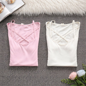 Maglie da donna rosa e bianca aderente con scollo a V incrociato in tessuto elasticizzato in nylon ed elastan vista frontale