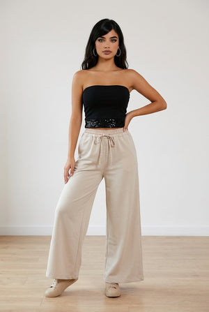 Pantalone palazzo con vita elasticizzata scozzese, cordino regolabile e tasche laterali