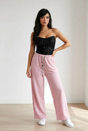 Pantalone palazzo con vita elasticizzata, coulisse regolabile e tasche laterali