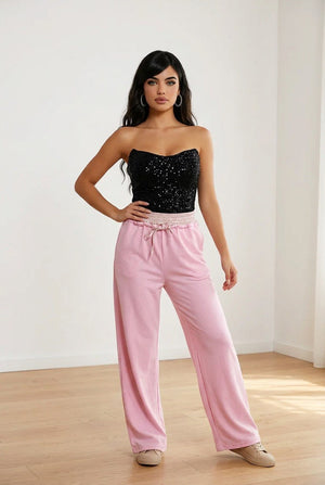 Pantalone palazzo rosa con vita elasticizzata scozzese, cordino regolabile e tasche laterali