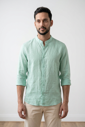 Camicia 100% lino, verde menta, chiusura 7 bottoni e bottone per arrotolare le maniche