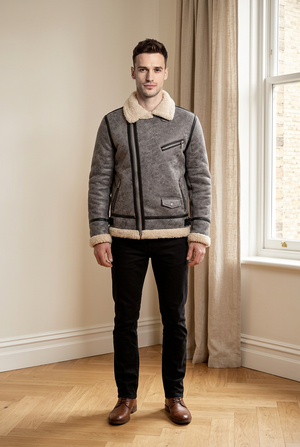 Giubbino uomo in ecopelle con interno in shearling, zip asimmetrica, colletto ampio con revers e tasche con zip
