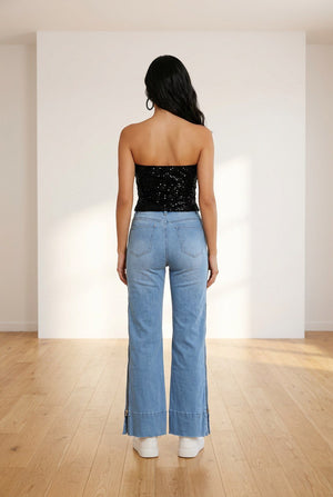 Jeans palazzo in denim chiaro high-waist con gamba ampia, 5 tasche e zip laterali, vista posteriore