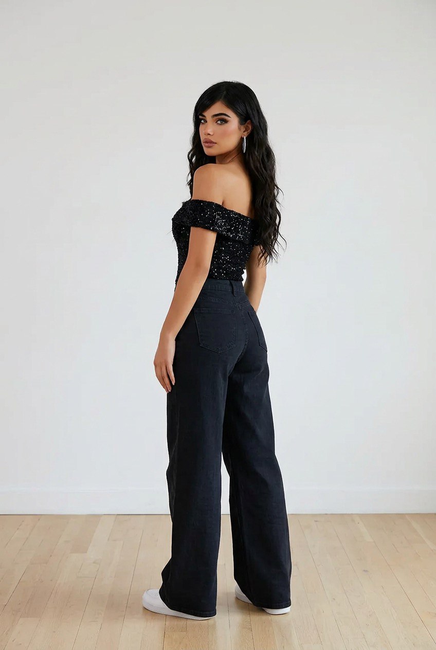 Jeans palazzo neri vita alta con strappi sulle ginocchia e design a 5 tasche, vista posteriore