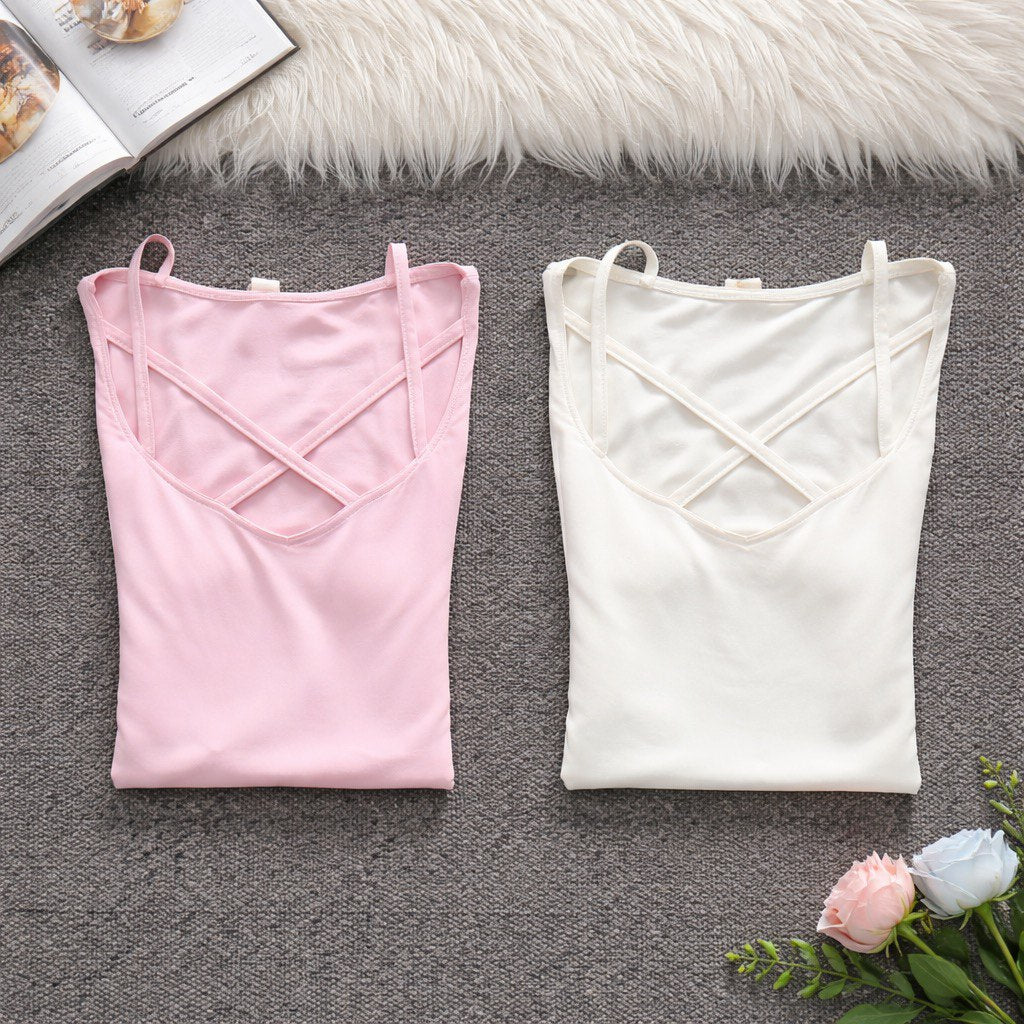 Maglie da donna rosa e bianca aderente  con scollo a V incrociato in tessuto elasticizzato in nylon ed elastan vista frontale