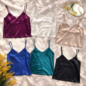 Top donna in poliestere bordeaux, bianco, blu navy, nero, blu, beige con spalline sottili e regolabili e ampio scollo a V